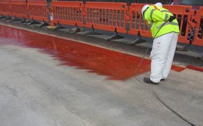 Spray waterproof coating for bridge deck waterproofing construction